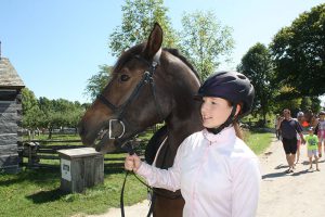 Upper Canada Village Horse Lovers' Weekend draws huge crowds News - September 7, 2016 Edition A young equestrienne in the Village parade. (Leader photo/W. Gibb)